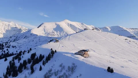 Drone footage captures a panoramic aerial view of Mont Joly and the Megeve ski Stock Footage 346689564