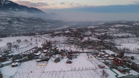 Drone footage capturing soft winter light at the edge of the day. Stock Footage 311794200