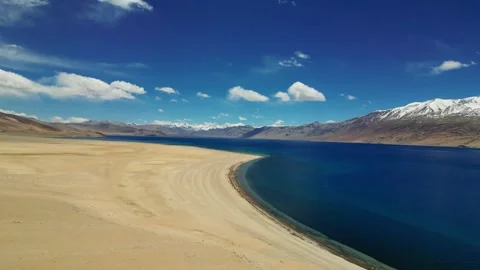 Drone footage capturing the stillness and surreal beauty of Tso Moriri Lake Stock Footage 310806908