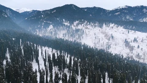 Drone footage capturing the surreal charm of Dhoodhpathri in snow. Stock Footage 311794386