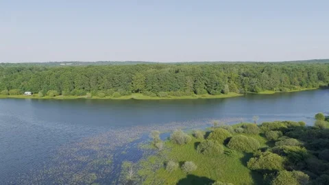 Drone footage capturing a wide aerial view of Lac du Bourdon in France, showing Stock Footage 346665558