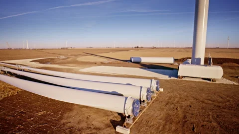 Drone footage capturing wind turbine construction in the Illinois countryside Stock Footage 328388096
