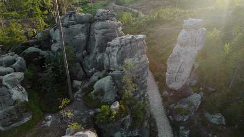 Drone footage of cliffs in the Czech forests at sunset Stock Footage 295190661
