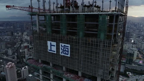 Drone footage construction workers building skyscraper in Kunming, China Stock Footage 99070425