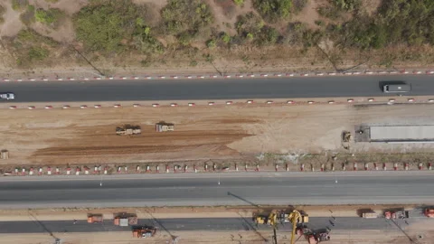 Drone footage a construction working tractor is refining the soil Stock Footage 330653456