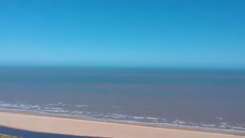 Drone footage of deep blue ocean beach Stock Footage 143229842