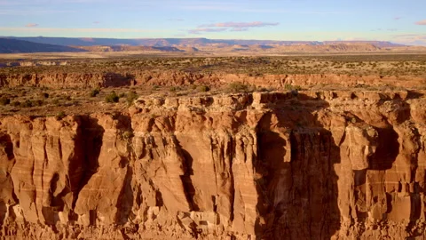 Drone footage of desert cliffs with striking red textures Video stock 334372591