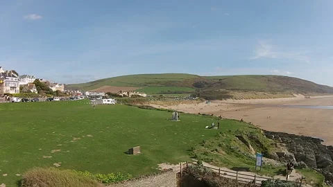 Drone footage of the Devon seaside town of Woolacombe Stock Footage 134266702
