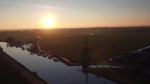 Drone footage of a Dutch windmill during sunset. Stock Footage 72680972