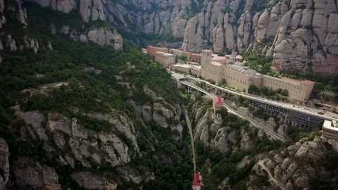 Drone footage of an epic mountain settlement called Montserrat in the foothills Stockbeeldmateriaal 332177757