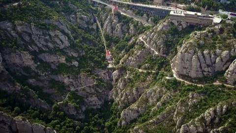 Drone footage of an epic mountain settlement called Montserrat in the foothills Stockbeeldmateriaal 332177833