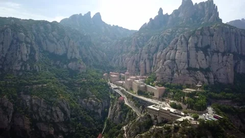 Drone footage of an epic mountain settlement called Montserrat in the foothills Stockbeeldmateriaal 332177838