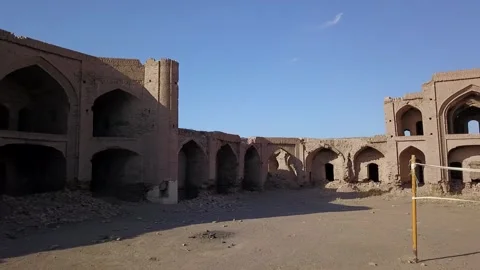 Drone footage flying across the front yard of a historic Persian caravanserai Vídeos de archivo 307791237