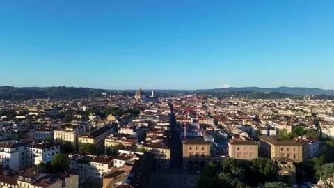 Drone footage flying high above Florence, Tuscany, Italy, showcasing a sea of Stock Footage 345997587