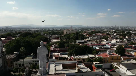 Drone footage of gorgeous statue, surrounded by historic sites Stock Footage 235123700