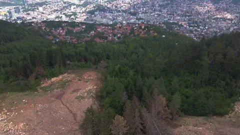 Drone Footage Gradually Moving Forward, Camera Lifting to Reveal Sarajevo Stock Footage 313548869