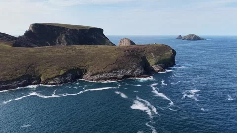 Drone footage of headland Eire 63 sign, near Portacloy, County Mayo, Ireland. Stock Footage 342711258