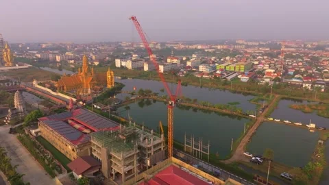 Drone footage of high-rise development glowing in early sunlight Stock Footage 304374060