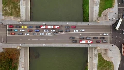 Drone footage of high traffic bridge in a city Stock Footage 254873665