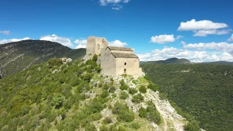Drone footage of the historic Samitier Castle perched on a rocky ridge Stock Footage 346664552