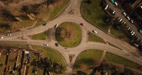 Drone footage hovering over a medium roundabout in an English town. Stock-Footage 87167540