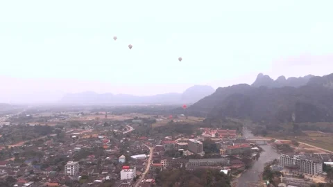 Drone Footage of Limestone Mountains Surrounding Vang Vieng, Laos  Scenic La Stock Footage 312943702