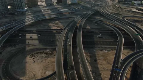 Drone footage of a massive highway intersection with lots of traffic, Dubai, 4k Stock Footage 152886150