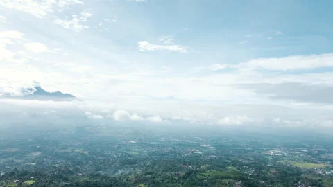 Drone Footage of Mountain Range and Clouds with Clear Sky Stock Footage 309180306