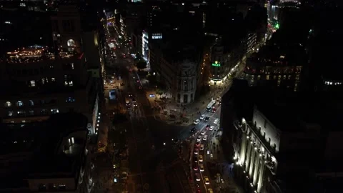 Drone footage of a night intersection in the capital of Spain. Stock Footage 189452129
