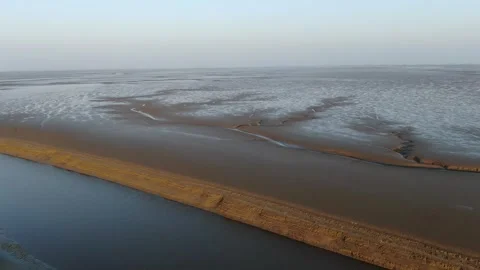 Drone Footage of North Sea Mudflats during Ebb Tide Stock Footage 313001453