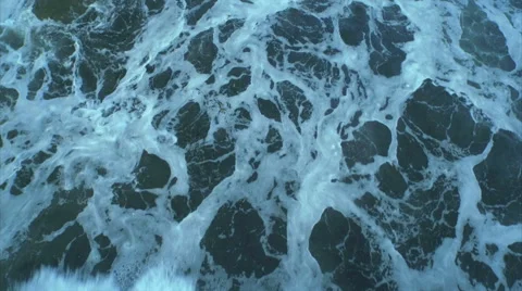 Drone footage of ocean waves reaching beach Stock Footage 50452631