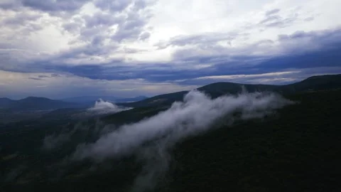 Drone footage ofclouds over the forest Video stock 243356253