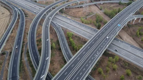 Drone footage over highway intersections 스톡 동영상 210083250