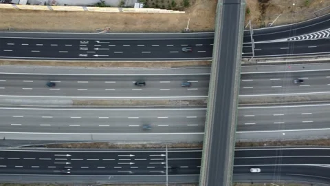 Drone footage over highway intersections 動画素材 210083355