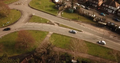 Drone footage over a medium roundabout in an English town. Stock-Footage 87167472