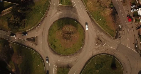 Drone footage over a medium roundabout in an English town. Видео 87167621