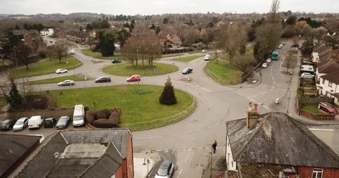 Drone footage over a medium roundabout in an English town. Видео 87167733