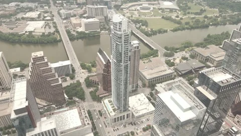Drone footage over skyscraper tower and urban buildings in Austin City, Texas Video stock 243935564
