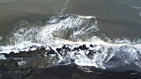 Drone Footage of the Pacific Ocean: Waves Crashing on the Beach Stock Footage 279018604