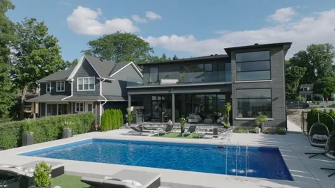 Drone footage of pool and backyard of luxury property Stock Footage 229562347