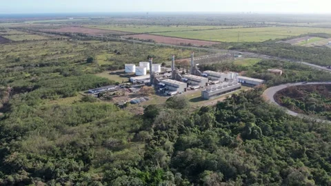Drone footage of power plants LNG or natural gas next to river Stock Footage 236530341