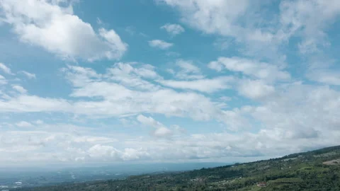 Drone Footage of Puffy Clouds in Blue Sky Stock Footage 308860665