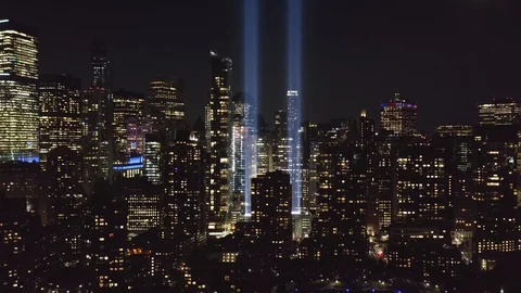 Drone footage with pull back motion in front of New York City skyscrapers Stock Footage 116207299