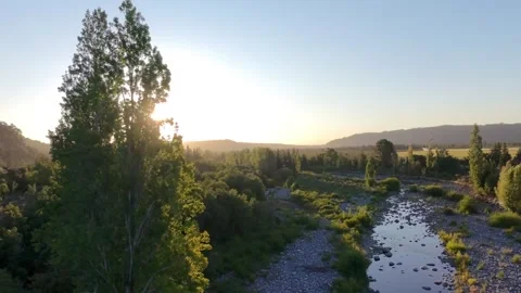 Drone footage of a river in a mountainous landscape Stock Footage 327242541