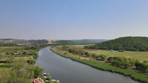 Drone Footage: Serene River Boat Fields Aerial View Video stock 301447953