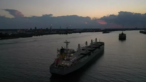 Drone Footage of Ships Sailing Down the Mississippi River in Louisiana Stock Footage 165995490