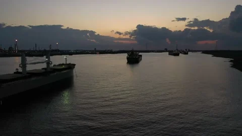 Drone Footage of Ships Sailing Down the Mississippi River in Louisiana Stock Footage 165996261