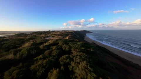 Drone footage shows rocky cliffs, beach Video stock 344580972