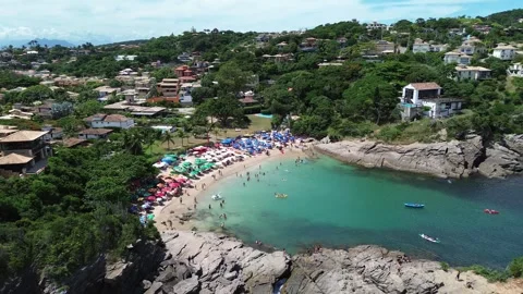 Drone Footage Side Tracking Shot of Ferradurinha Beach, Búzios, Brazil Video stock 339039554