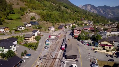 Drone footage of a small town surrounded by mountains in Italy (4K) Stock Footage 189363028